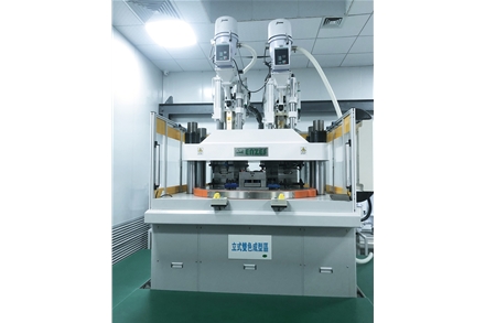 Vertical two-color molding machine